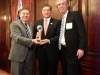 George Tsetsekos and Paul McCulley present the Global Citizen Award to Jeffrey Lacker.